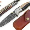 Damascus engraved folding knife